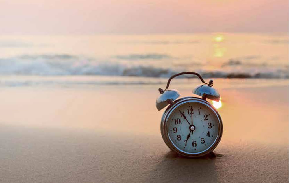 Clock on a beach